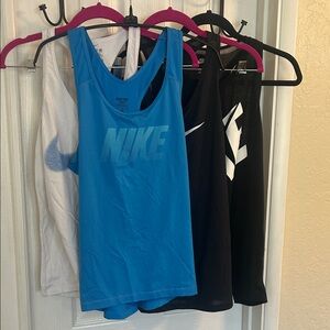 Nike 4 running tanks / 3 shorts / 1 long short/ one legging all M
